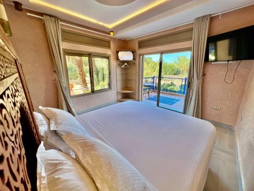 Dar NFis Suites et appartements de luxe dans un havre de paix vue paradisiaque au bord du lac