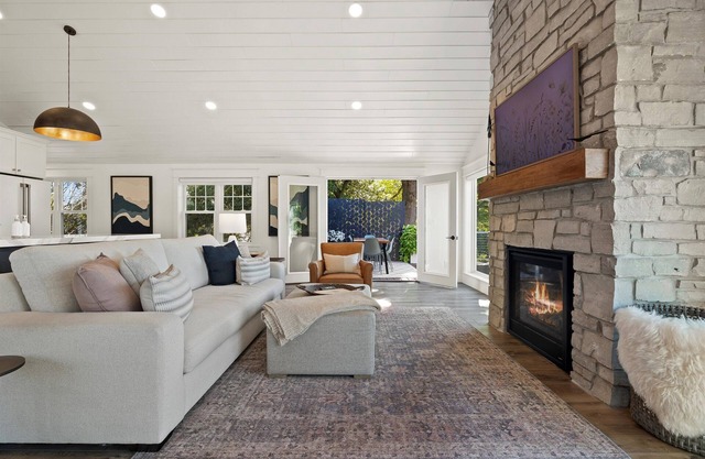 Designer Home with Lake Views + Cozy Fireplace
