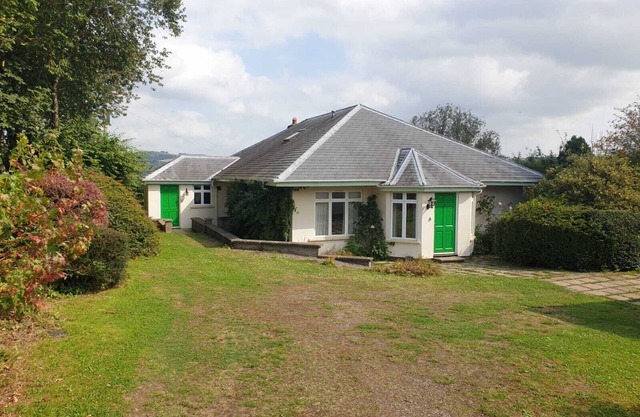Detached rural bungalow, with sunroom, parking and enclosed garden