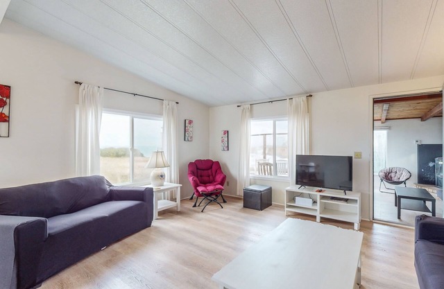 Dog-friendly home with private beach access, hot tub & stunning views