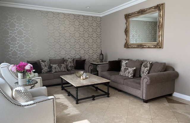 Elegant and Spacious home with a private backyard and pool.