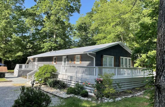 Enjoy peaceful lake life at the Cozy Lake Gaston Estates Cottage!