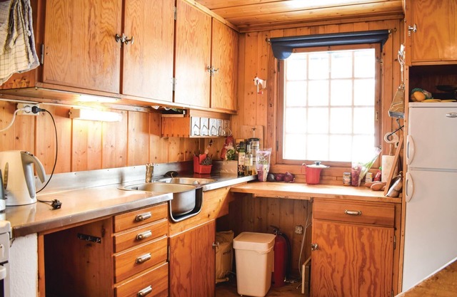 Enjoy the real cabin feeling with a view of Krøderen and the mountains.
