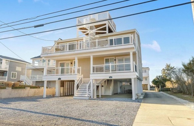 Exceptional Beach facing townhome with stunning Ocean and Bay views