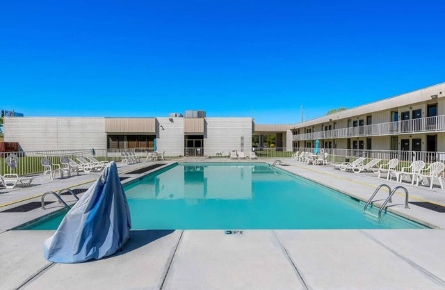 Experience Relaxation with Pool and Free On-Site Parking | 4 Affordable Rooms