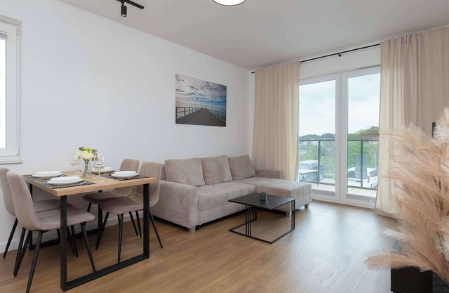 Family Apartment in Gdynia with Parking and Playground by Noclegi Renters