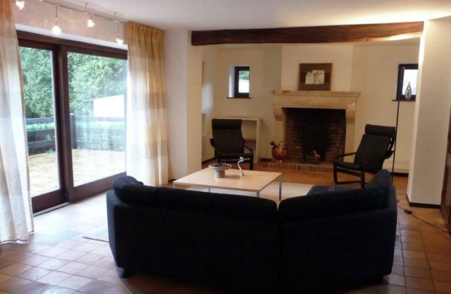 Family holiday home with beautiful garden beside the Ourthe and the RAVeL.