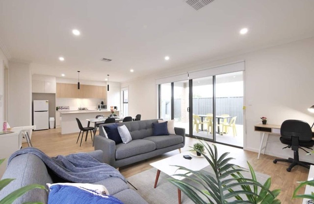 FEEL HAPPY & AT HOME HERE. No stairs. Modern designer space. Ducted A/C. Double garage.