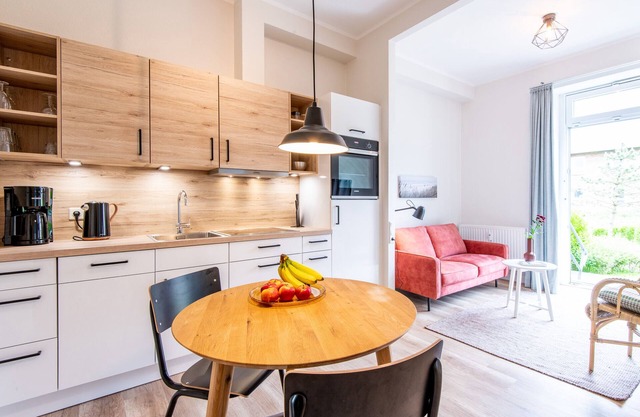 Ferienwohnung im Erdgeschoss mit Eigener Holzterrasse