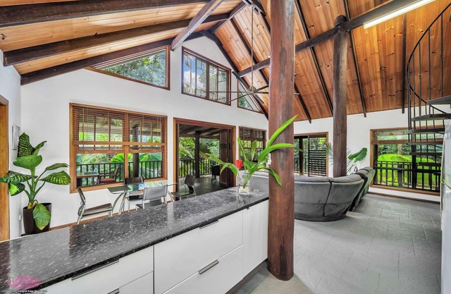 Fern House ~ your serene rainforest retreat.