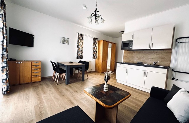 First floor apartment with east and south-facing balcony (58 sqm)