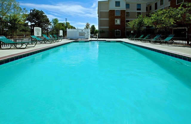 Free Breakfast + Outdoor Pool | 24 Hour Fitness Center
