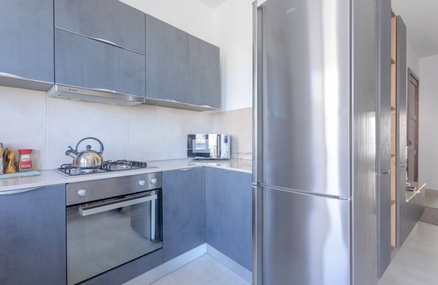 Fully Air-Conditioned 2 Bedroom, 2nd Floor Apartment.