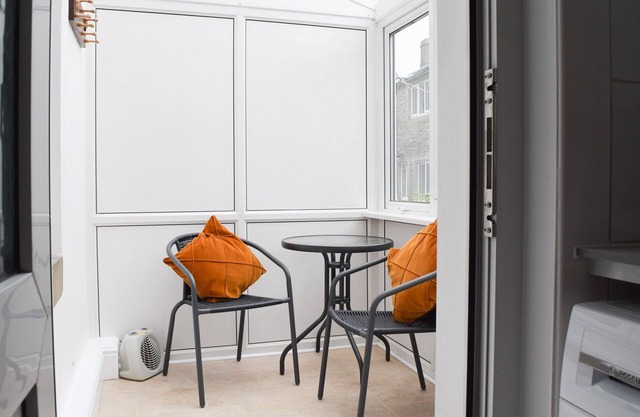 Ground Floor: Living room: TV, Freesat, DVD Player, Open Fire Dining room.