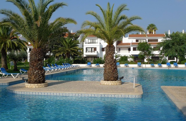 Ground Floor Apartment in Lakeside Village overlooking lake, pool and gardens.