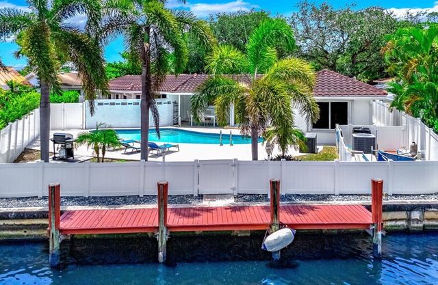 Heated Pool + Waterfront! Close To Beach & Shops!