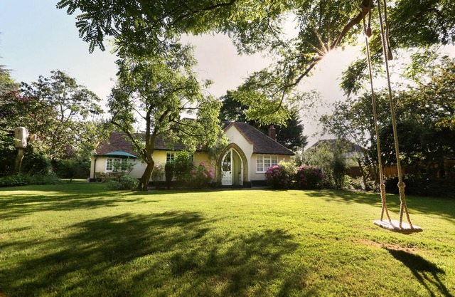 Historic Royal Kent cottage surrounded by large gardens & private swimming pool