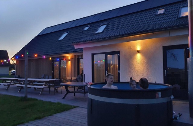 Holiday home with sauna and hot tub