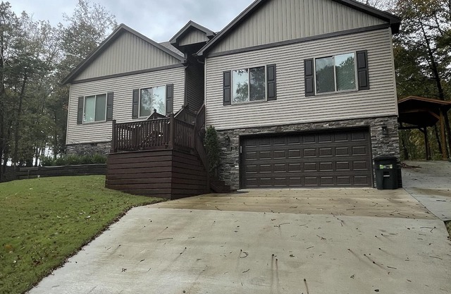 House located on Golf Course, community pools, hiking and ATV trails, close to G