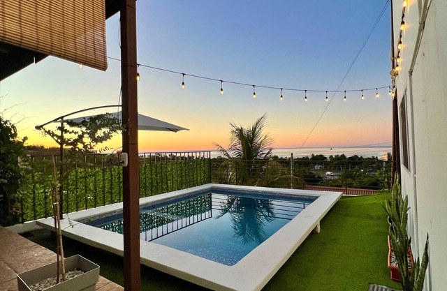 house with a beautiful sea view in enchanting SurfCity with WiFi, AC and Pool.