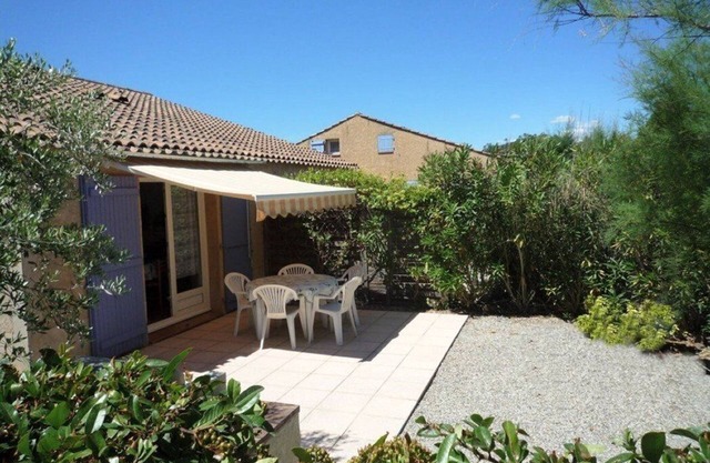 house with garden, between sea and mountain
