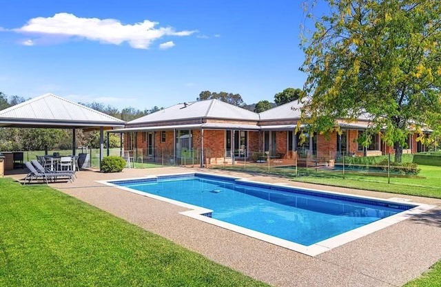 Hubbard Hill Yarra Glen Oasis: 4-Bdrm Home with Pool & Stunning Valley Views