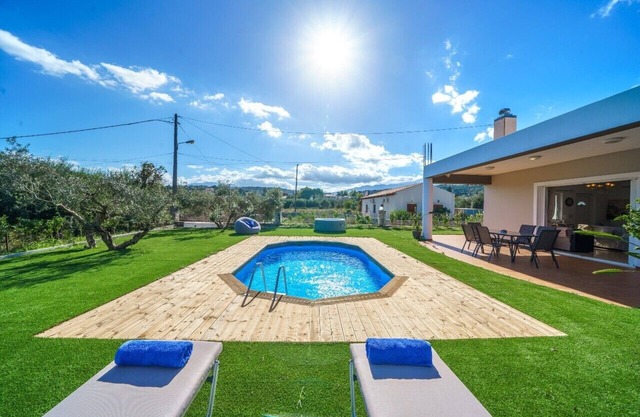 In the "Tuscany of Crete," dive into the pool and unwind in the hot tub!