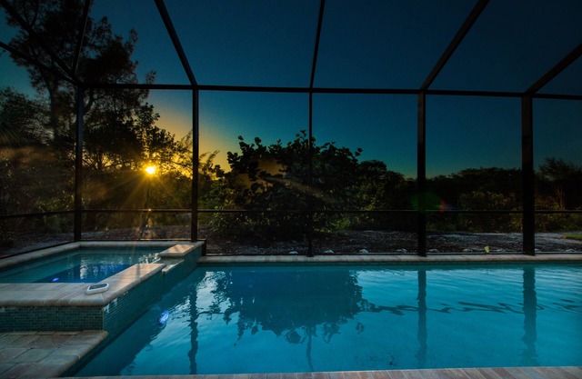 Key West appeal & gorgeous Sanibel River views& bicycles -Villa Calypso Tides- Roelens Vacations