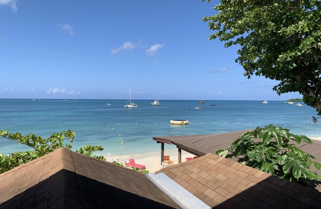 King Suite at Oceanview Resort in Jamaica - Enjoy 7 miles of White Sand Beach! by RedAwning