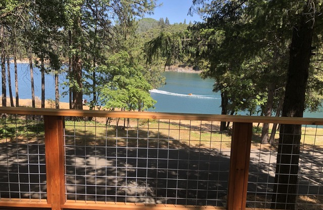 Lakefront house with 1000 sq/ft of decking with unobstructed view of the water.
