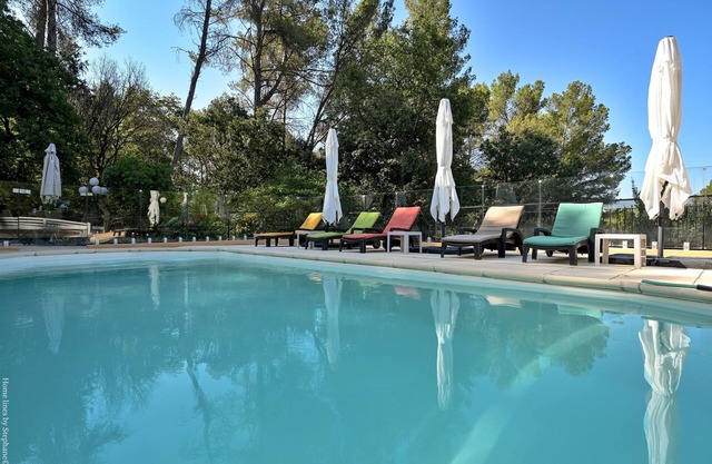 Large studio with terrace and pool view
