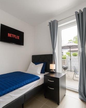 LETA Homes - Komfortables Gästehaus - eigene Parkplätze & Traumterrasse