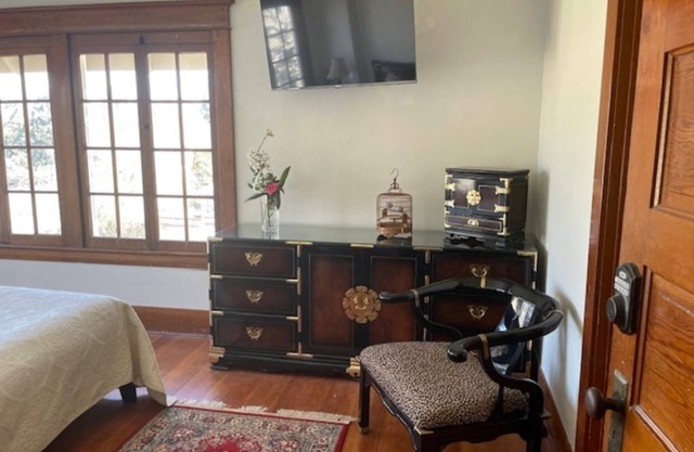 Light-filled room with a treetop view in an updated historic Forest Grove home!