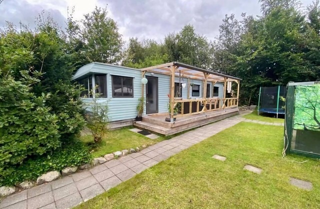 Lovely chalet in De Pol with garden