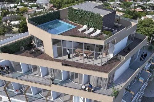 Lujoso Penthouse a estrenar en Sofisticado Barrio y Edificio Vista panorámica 100m2 Gimnasio Piscina Lujoso Salon de Fiestas Parking privado gratis con acceso directo al departamento