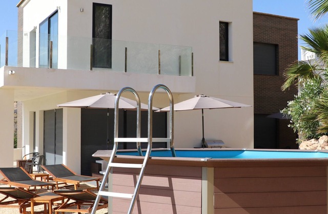 Luxurieus modern villa with pool at golfcourse at 6 km from the beach