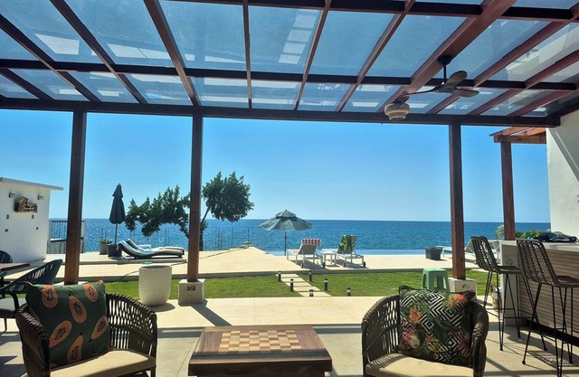 Luxury 4BR Oceanfront Villa in Whitehouse: Large Pool, Chef, Private Sea Access
