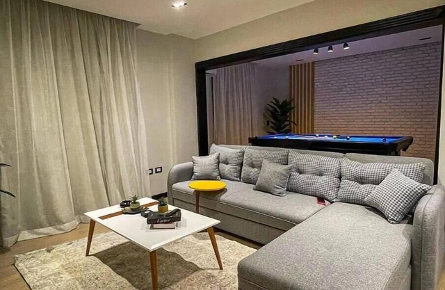luxury condo with pool table