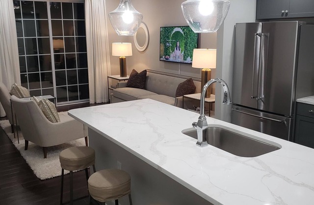 LUXURY MAIN ST. CONDO WITH BALCONY