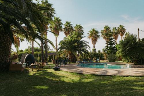 Maison jardin tropicale piscine - Quatre Murs Et Un Toit