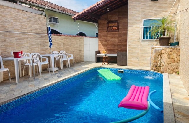 Modern and cozy house with fireplace and heated pool just 50m from the beach