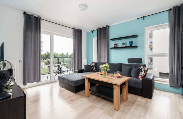 Modern Apartment with Balcony & FREE GARAGE Poznan by Noclegi Renters