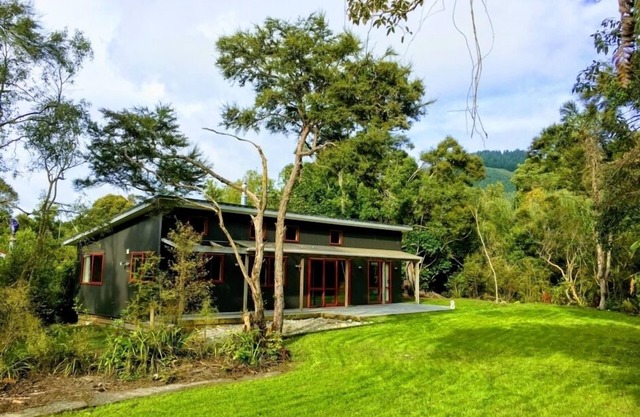 Modern bach in secluded native bush