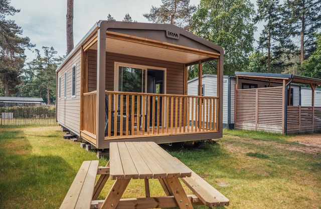 Modern chalet with luxury bathroom and screened porch
