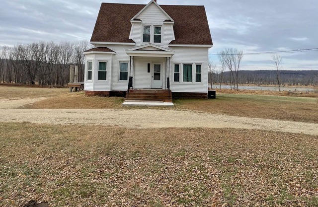 Modern Farmhouse north of town right by the Mississippi River
