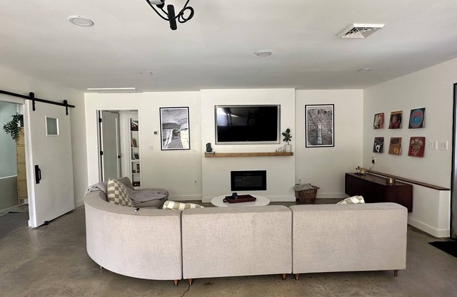 Modern Living inside a former Motorcycle Showroom— Stylish & One of a Kind