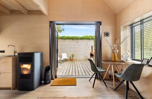 Nature house with wood stove and view