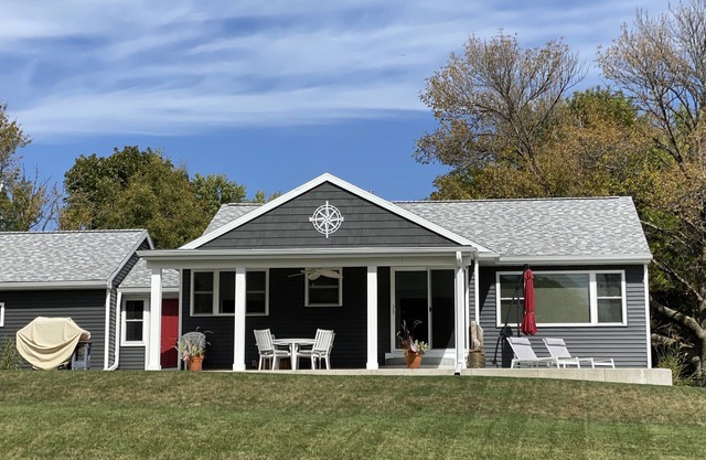 Nautical lakeview home with boat launch across the street from your rental home.