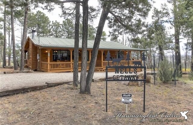 Nell's Getaway: 'Vacation in this Picturesque Cabin in the Woods!'