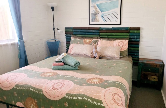 Nestled behind the low hanging branches is this cute and cozy one bedroom unit